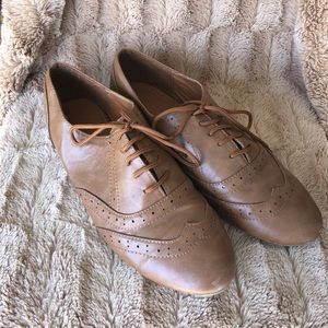 Brown oxford style flats